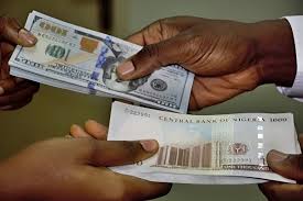 Naira Falls to N1,570 per Dollar in Parallel Market